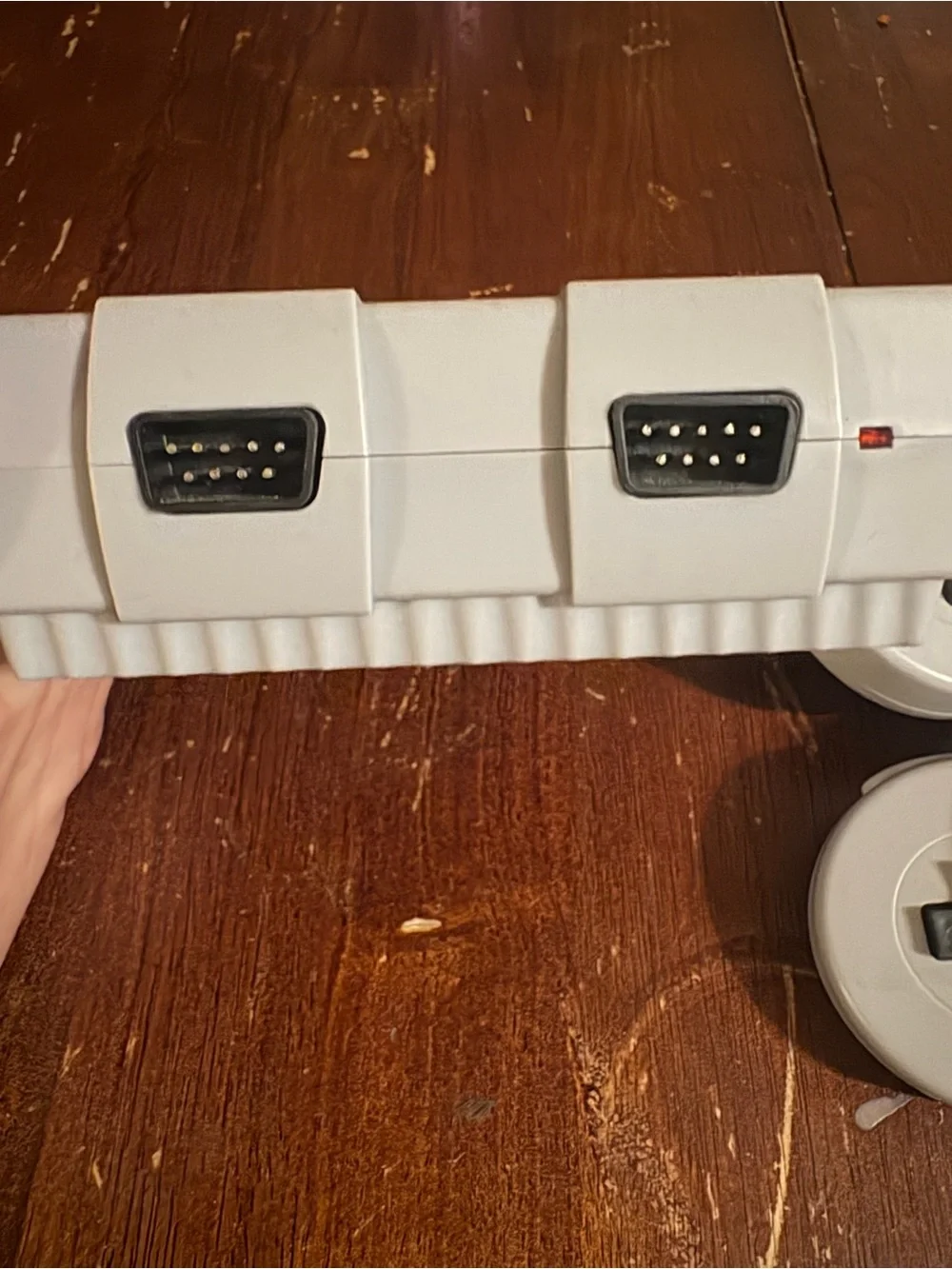 Nintendo Mini Gaming Console in Gray with Purple Buttons and Gray Controllers